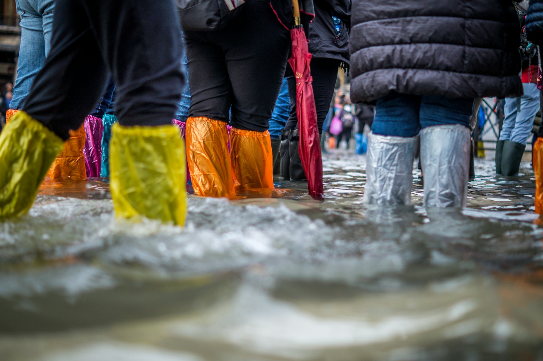 Volunteers standing together in floodwater